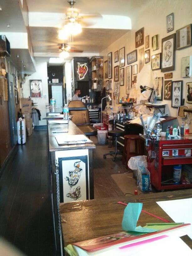 Ocho Placas Tattoo Company